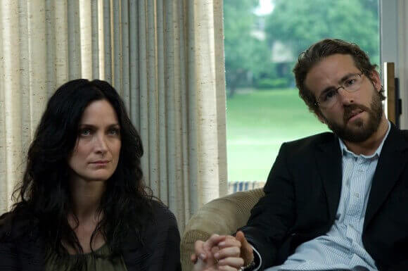 Carrie-Anne Moss and Ryan Reynolds in Fireflies in the Garden