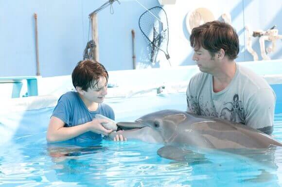 Nathan Gamble and Harry Connick Jr in 'Dolphin Tale'