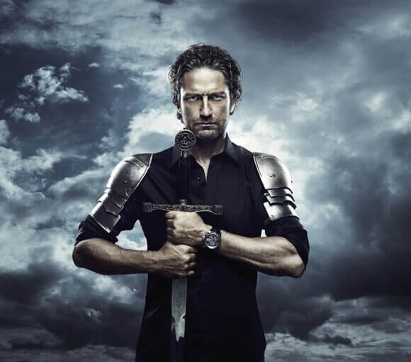 Gerard Butler poses with a Roger Dubuis watch
