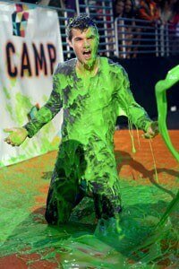 Taylor Lautner gets slimed at the 2012 KCA