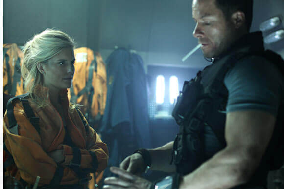 Maggie Grace and Guy Pearce in 'Lockout'