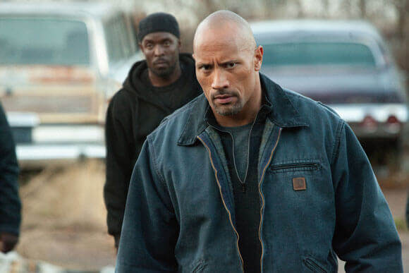 Michael K Williams and Dwayne Johnson in 'Snitch'