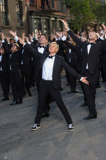 Ellen DeGeneres surrounded by dancers in the Oscar Trailer
